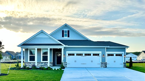Woodfield Preserve Bristol home with a three-car garage.