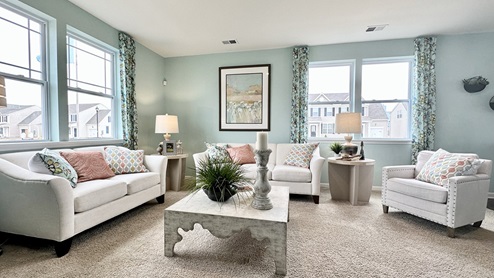 Living area with large windows.