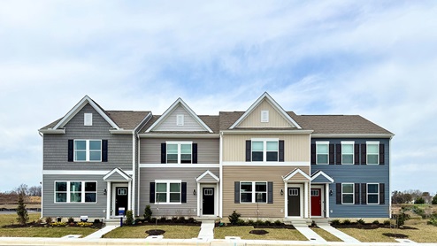 Simpsons Crossing model exterior photo of our Jefferson townhomes.