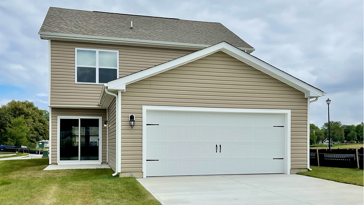 The two-car garage with a private entrance is behind the home.