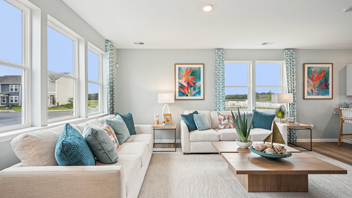 Large windows fill the living room.