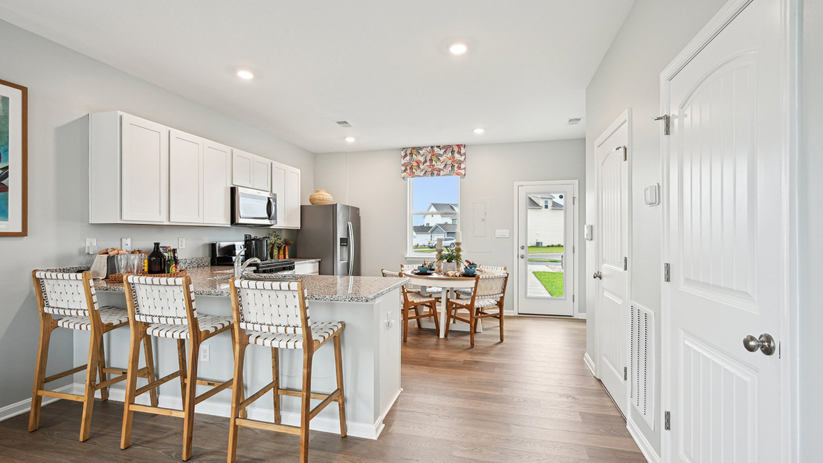 The kitchen has space for a dining area.