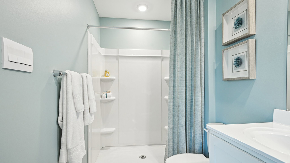 Primary bathroom has a walk-in shower.