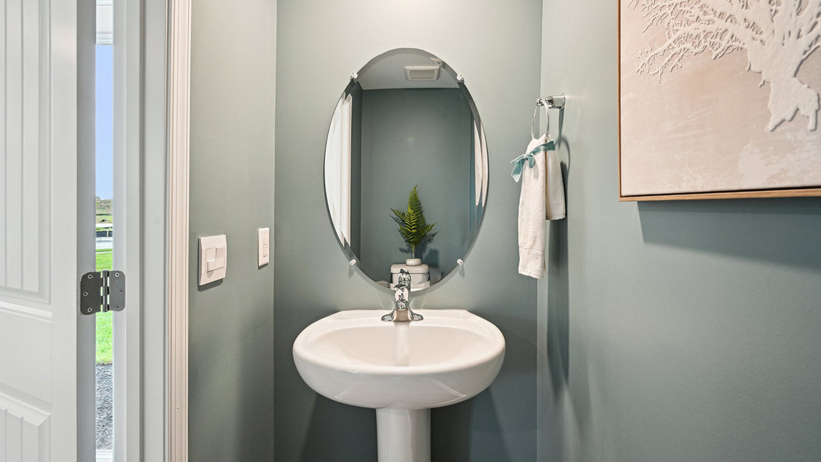 A powder room is off the dining area.