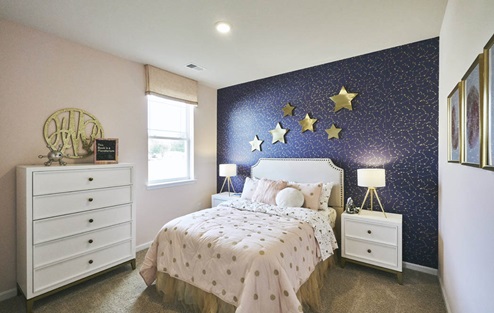 Guest bedroom with lots of natural light.