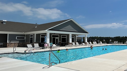 Headwater Cove's clubhouse with community pool.