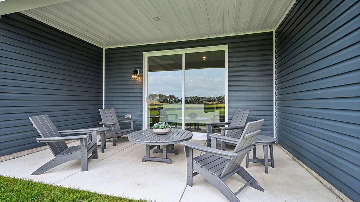 There is a quiet covered porch is in the back of the home.