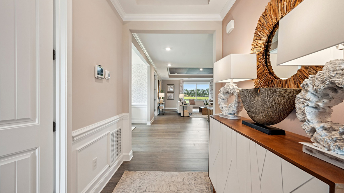 Large hallway entrance with upgraded wood trim.