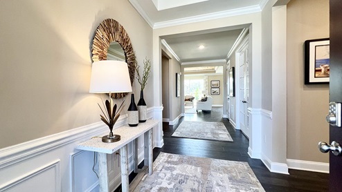 A welcoming foyer leads you inside the home.