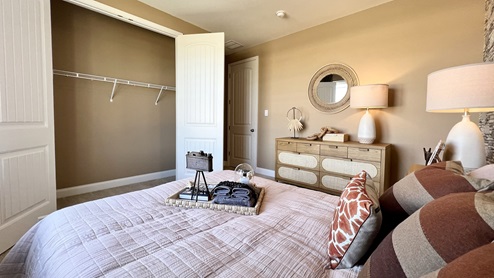 The first guest bedroom has a large closet.