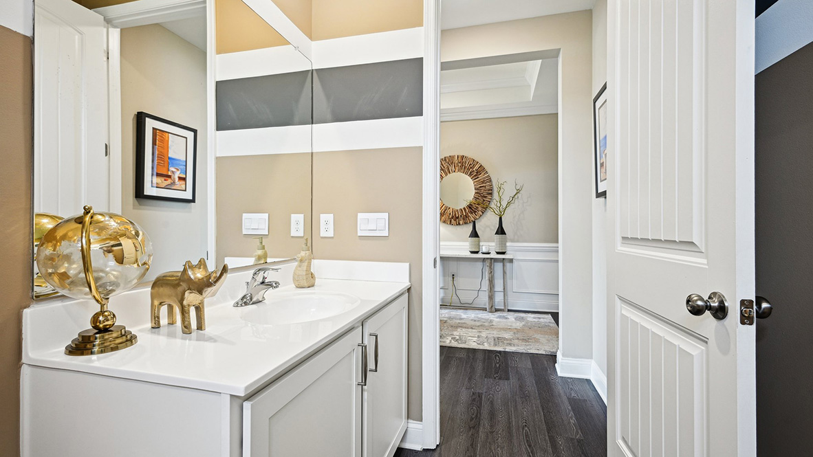 The guest bathroom is right next to the guest bedroom.