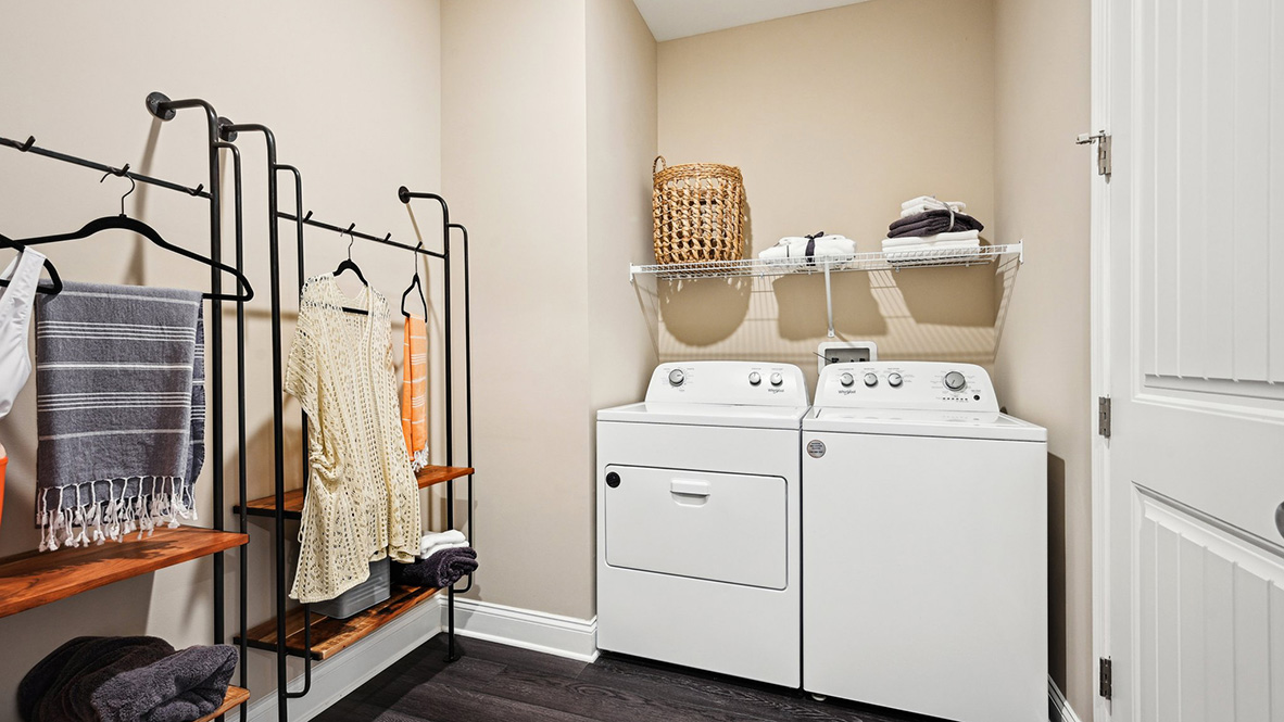 On the other side of the hallway is convenient laundry room.