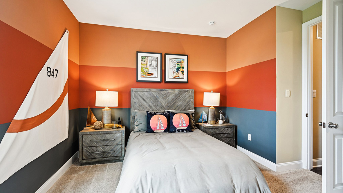 Another guest bedroom has lots of natural light.
