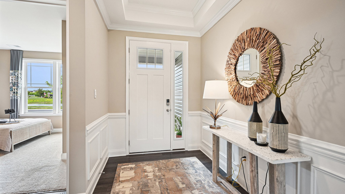 A welcoming foyer leads you inside the home.