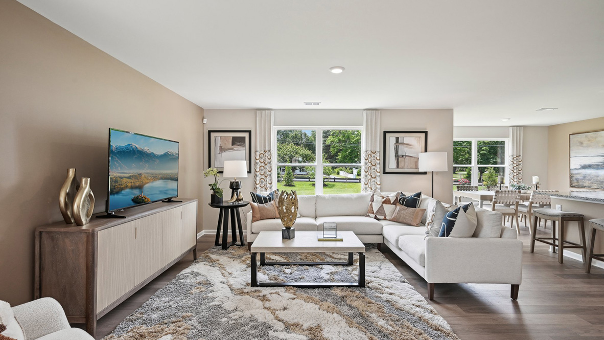 The open floorplan allows you and your loved ones to spend quality time together while in the living room, casual dining area and kitchen.