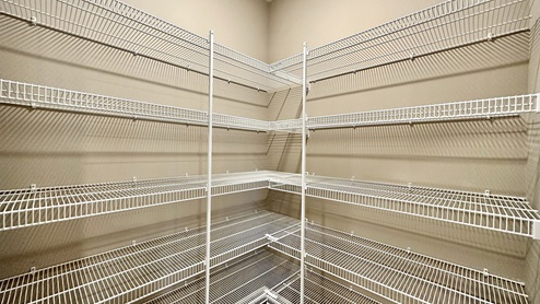 The pantry closet gives plenty of room for storage.