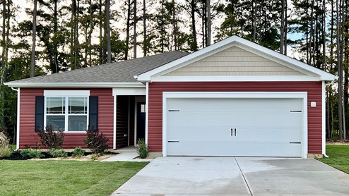 A Lismore ranch home with red siding.