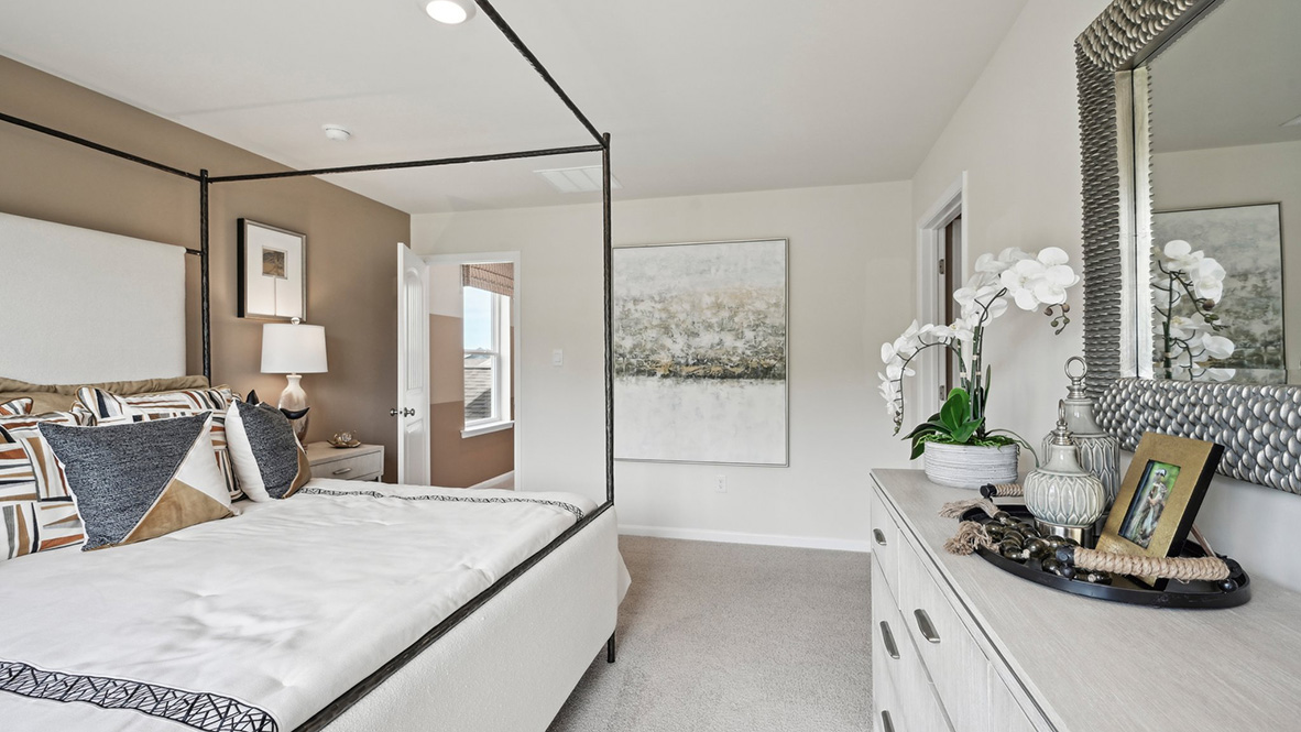 Upstairs you will find the owner's suite complete with a private, double-bowl vanity bathroom and two oversized walk-in closets.