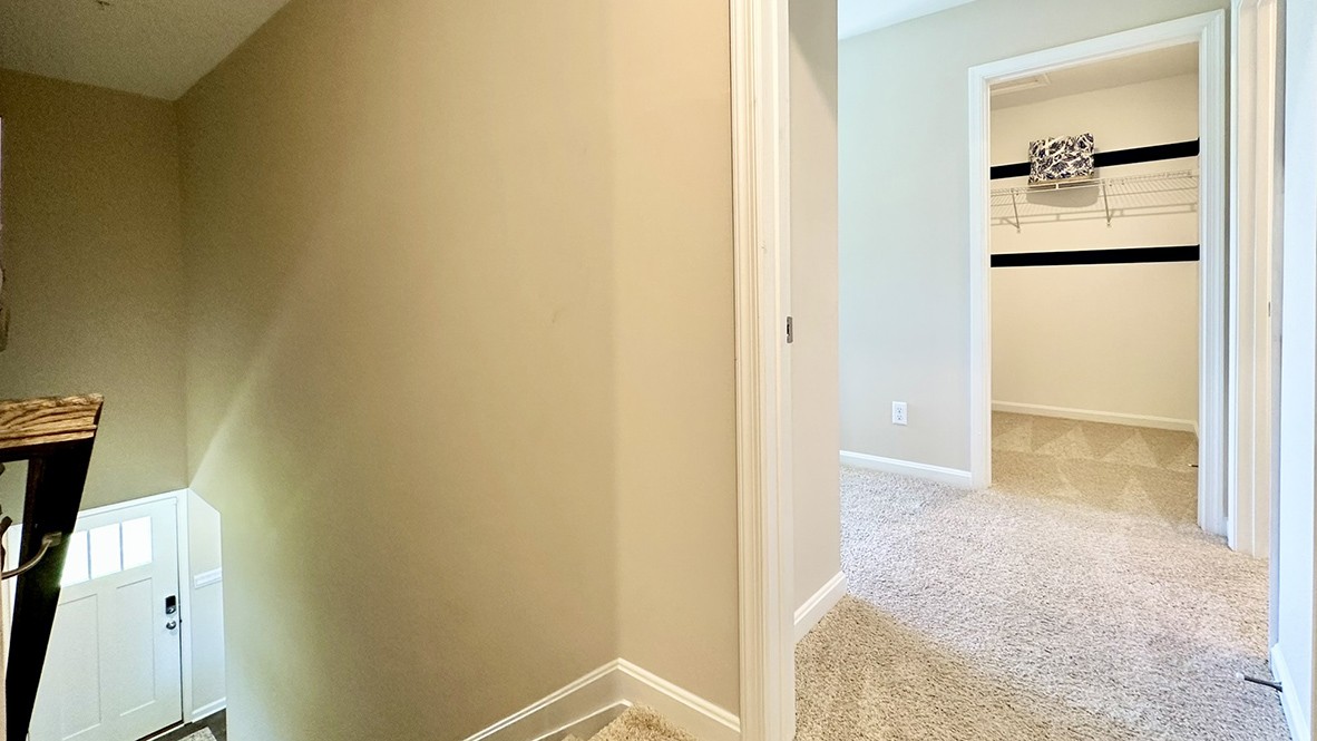 The upstairs hallway is spacious.