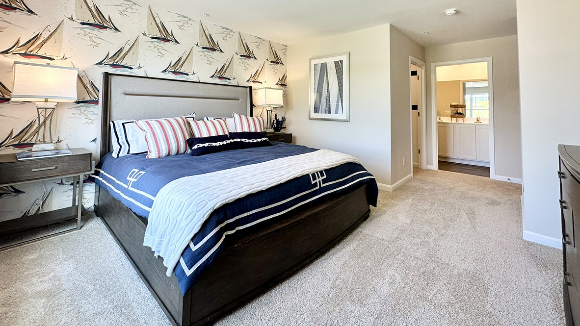 The spacious owner's suite boasts a private bathroom with dual vanity.