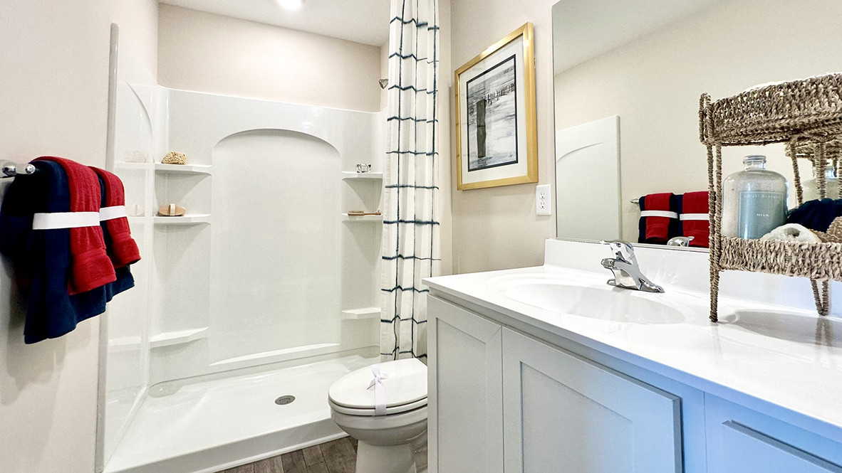 The owner's suite bathroom has a walk-in shower.