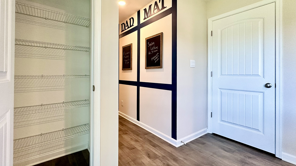 The kitchen offers a pantry closet.