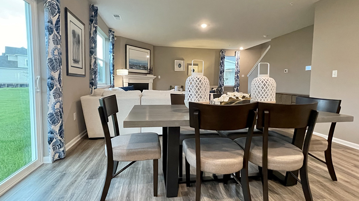 An eat-in dining space flows perfectly into the sizeable family room.