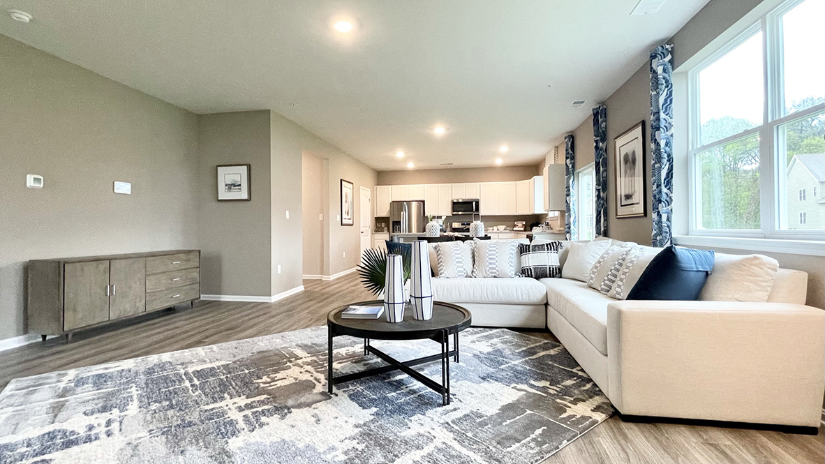 The kitchen has an eat-in dining space that flows perfectly into the sizeable family room.