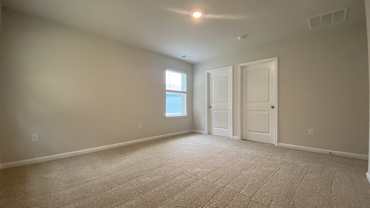 The large owner’s suite is a retreat in the back of the home.