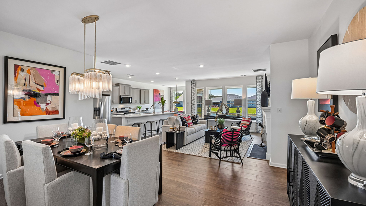The open floorplan features a well-designed kitchen.