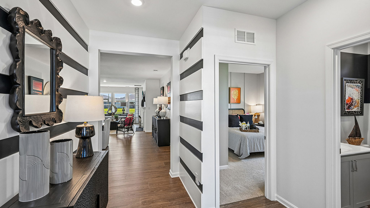 The welcoming foyer separates to afford privacy to the two spacious guest bedrooms.