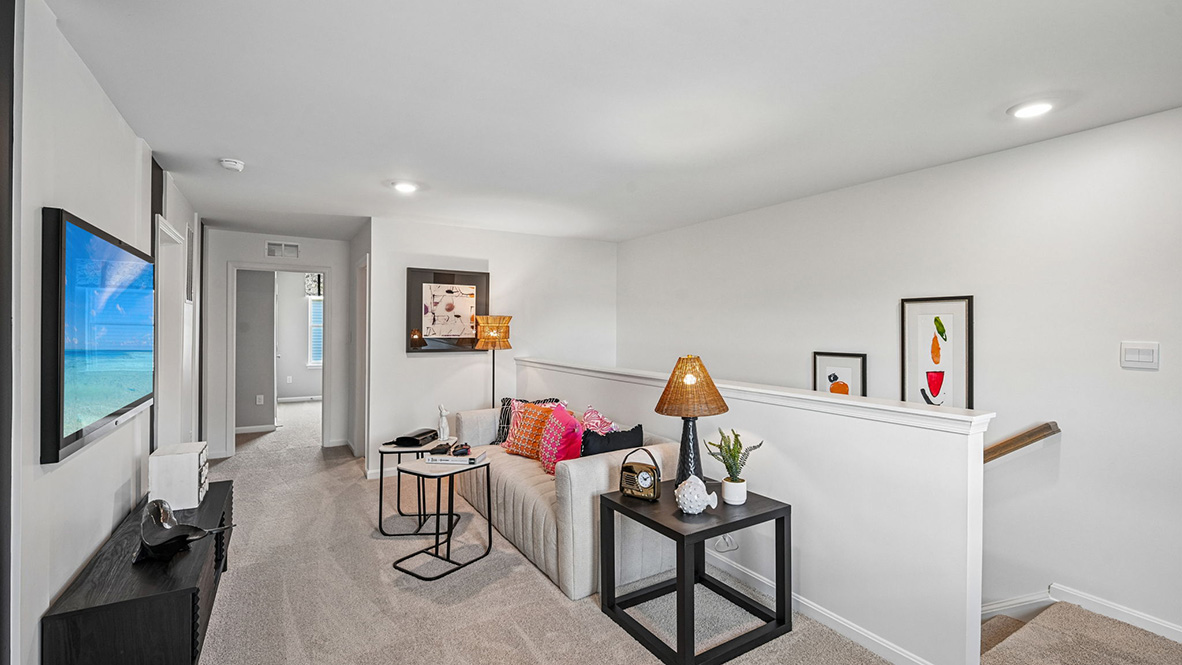 Upstairs, there is an additional bedroom, with plenty of closet space, a full bathroom and a loft.