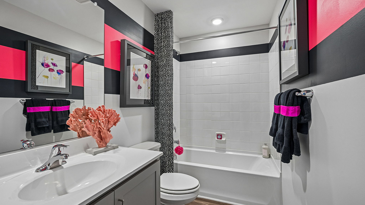 Upstairs, there is an additional bedroom, with plenty of closet space, a full bathroom and a loft.