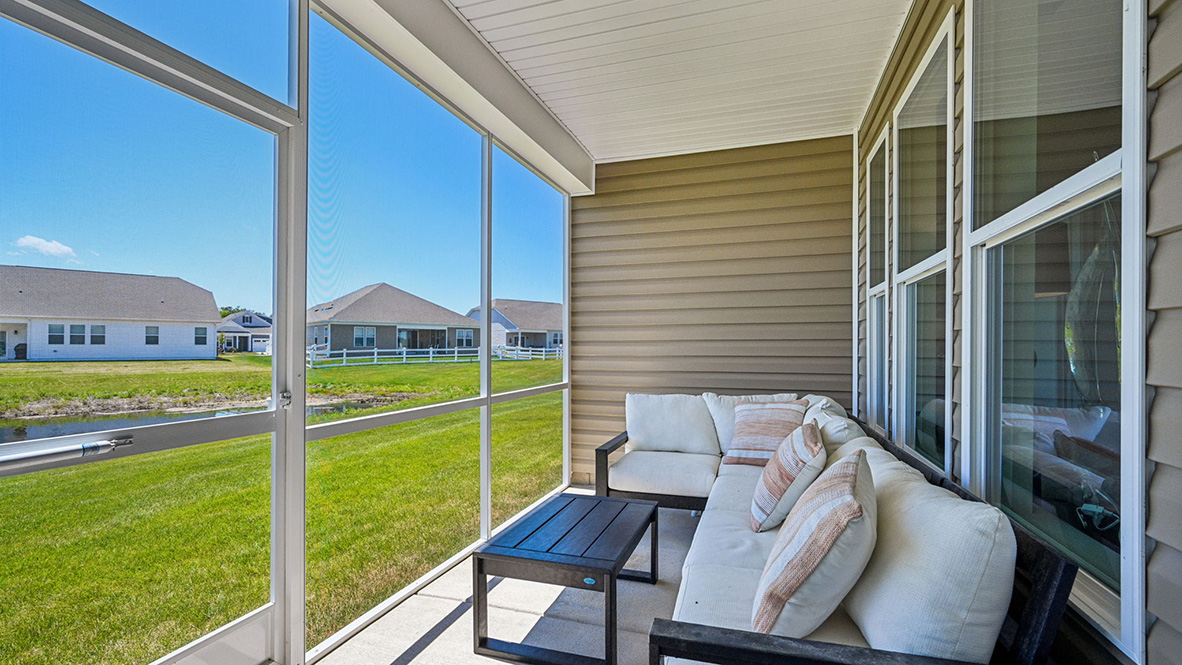 Enjoy the private covered porch in the back of the home.