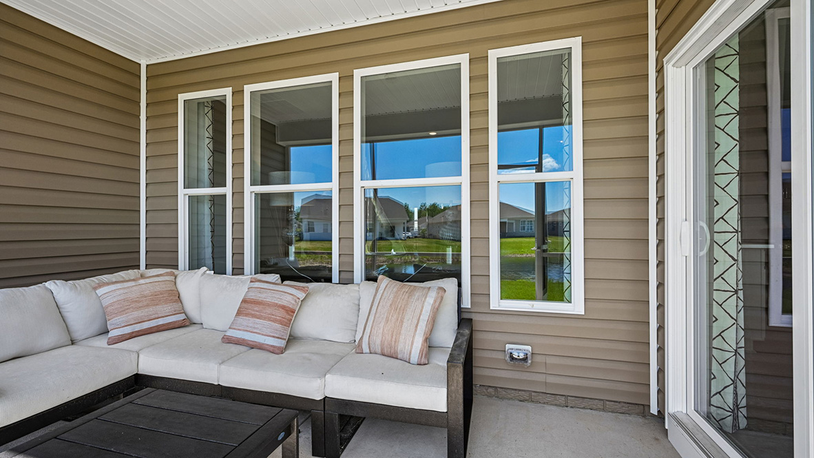 Enjoy the private covered porch in the back of the home.