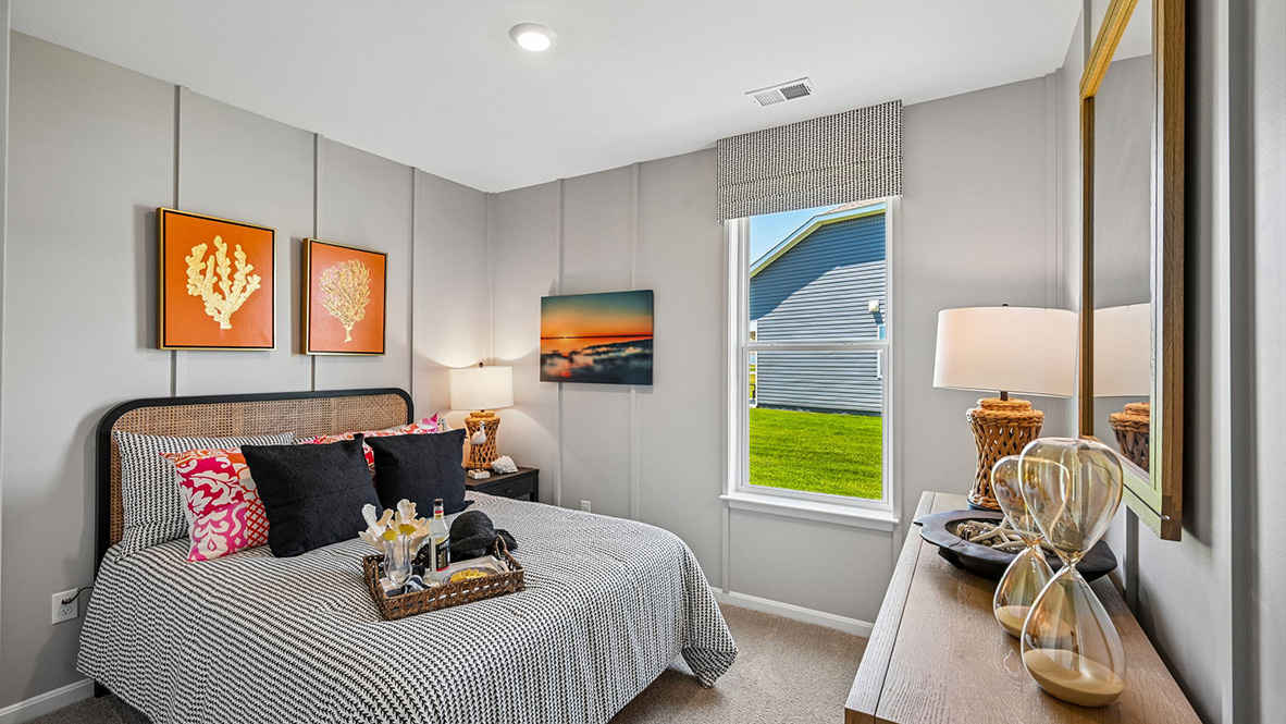 The welcoming foyer separates to afford privacy to the two spacious guest bedrooms.