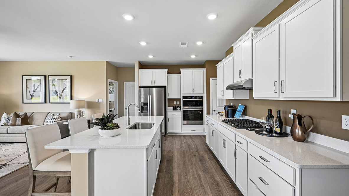 The home's well-designed kitchen features stylish soft close cabinets.