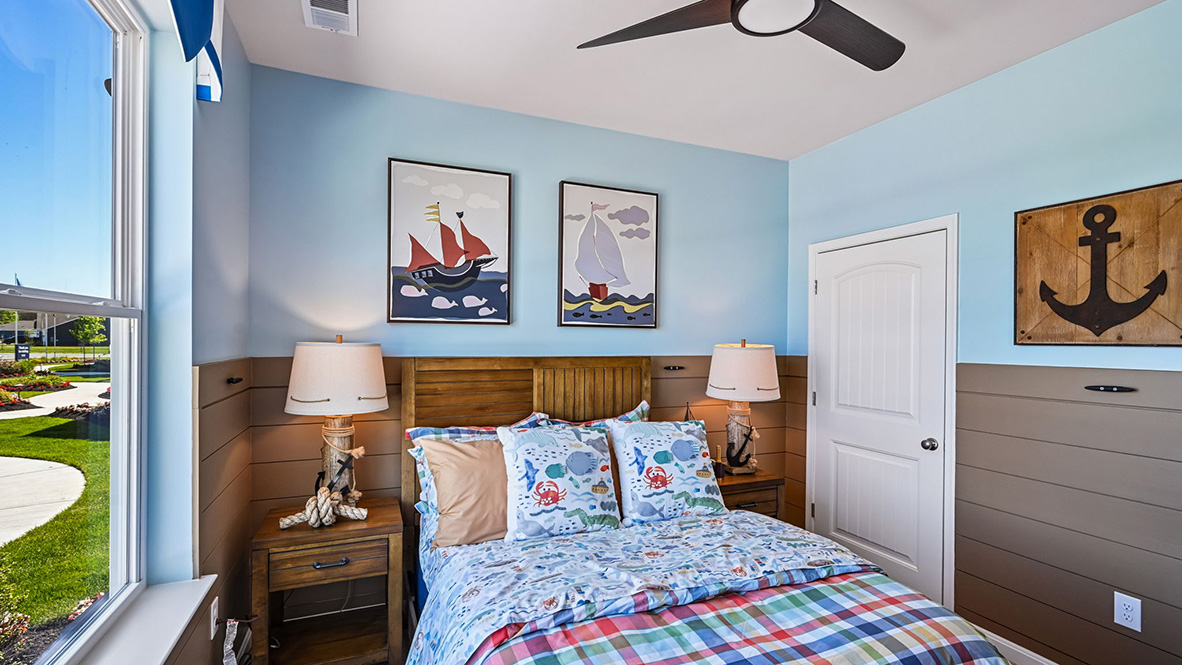 Two guest bedrooms are at the entrance of the home.