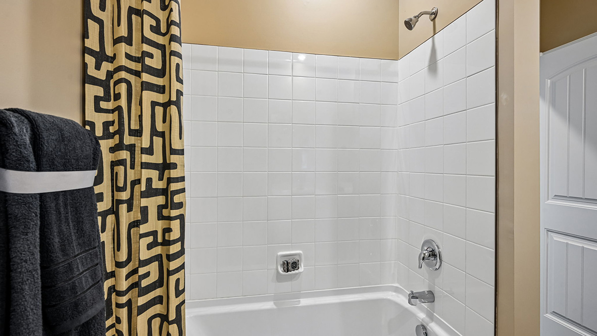 A shared guest bathroom is at the front of the home.
