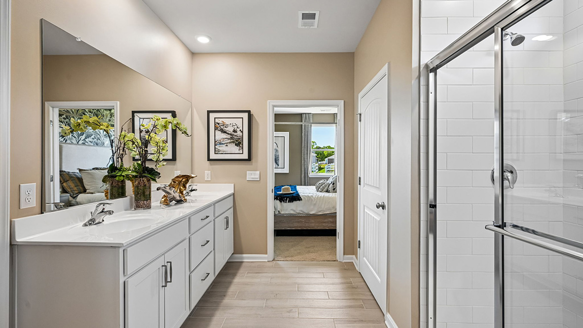 The large owner’s suite has a private bathroom.