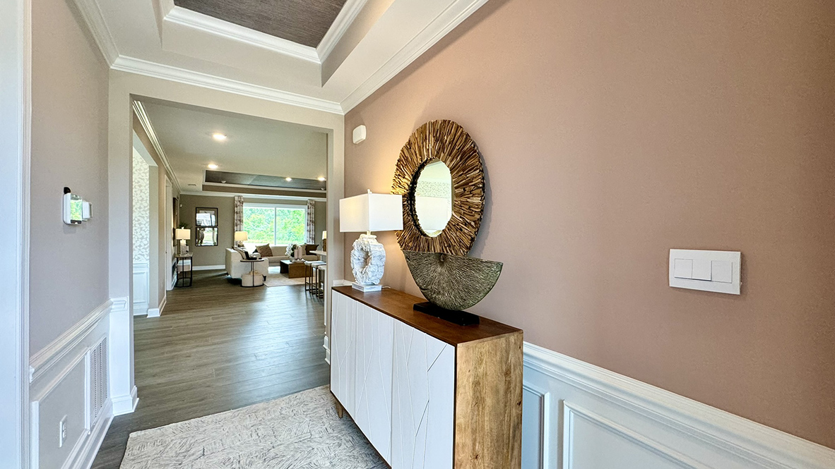 Large hallway entrance with upgraded wood trim.