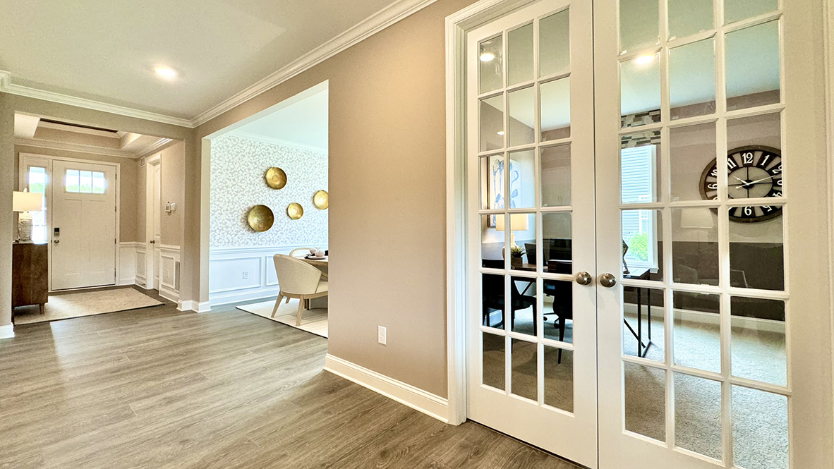 Foyer connects to the dining room and flex room.