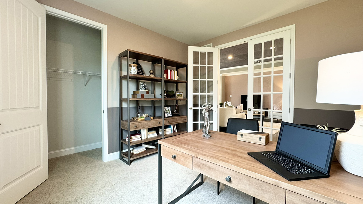 The flex room has glass French doors.