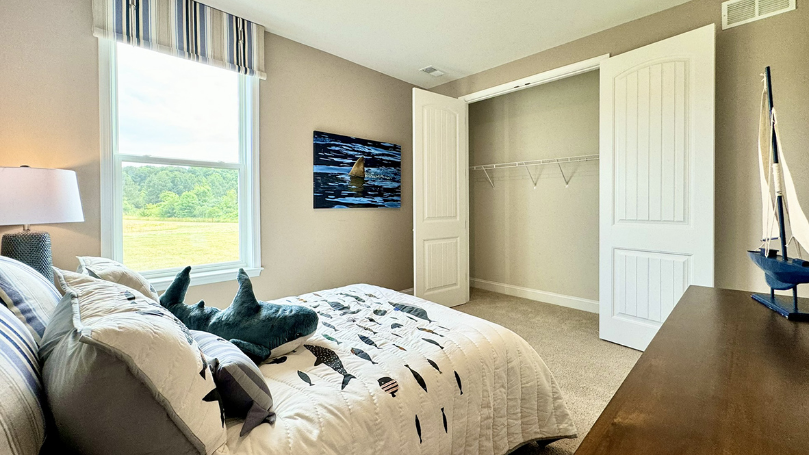 Large closet in secondary bedroom.