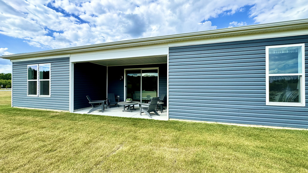 A quiet covered porch is in the back of the home.