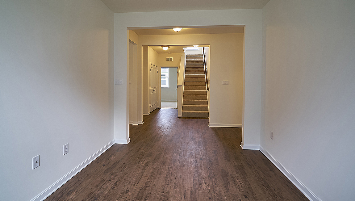 The open foyer leads you into the home.