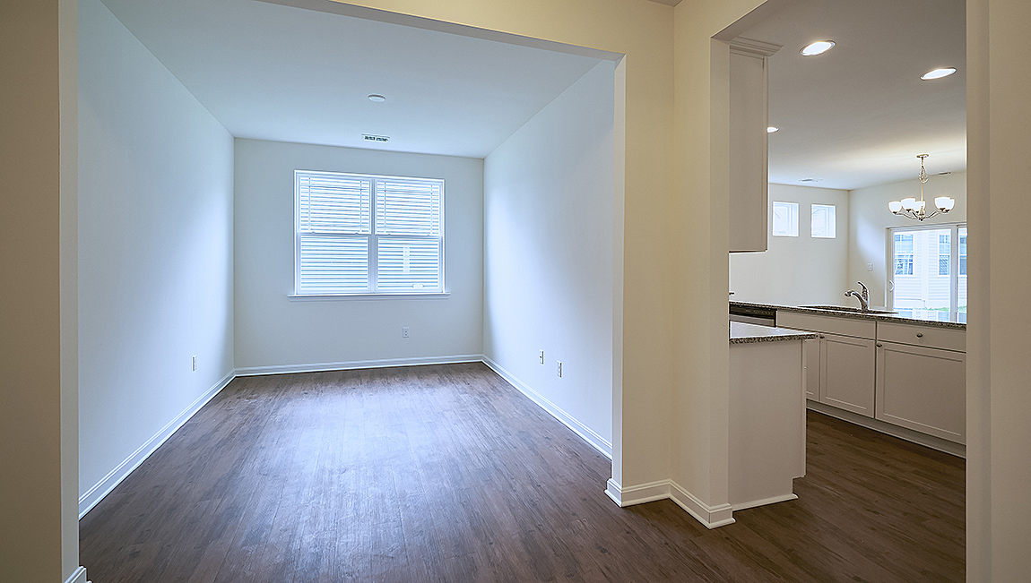 The flex room has beautiful French doors creating a perfect space to use as a study, den, or formal dining room.