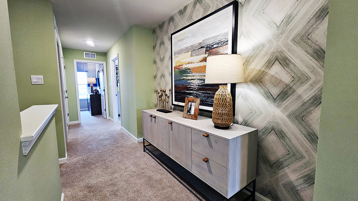 Upstairs you will find a spacious hallway leading to four large bedrooms.