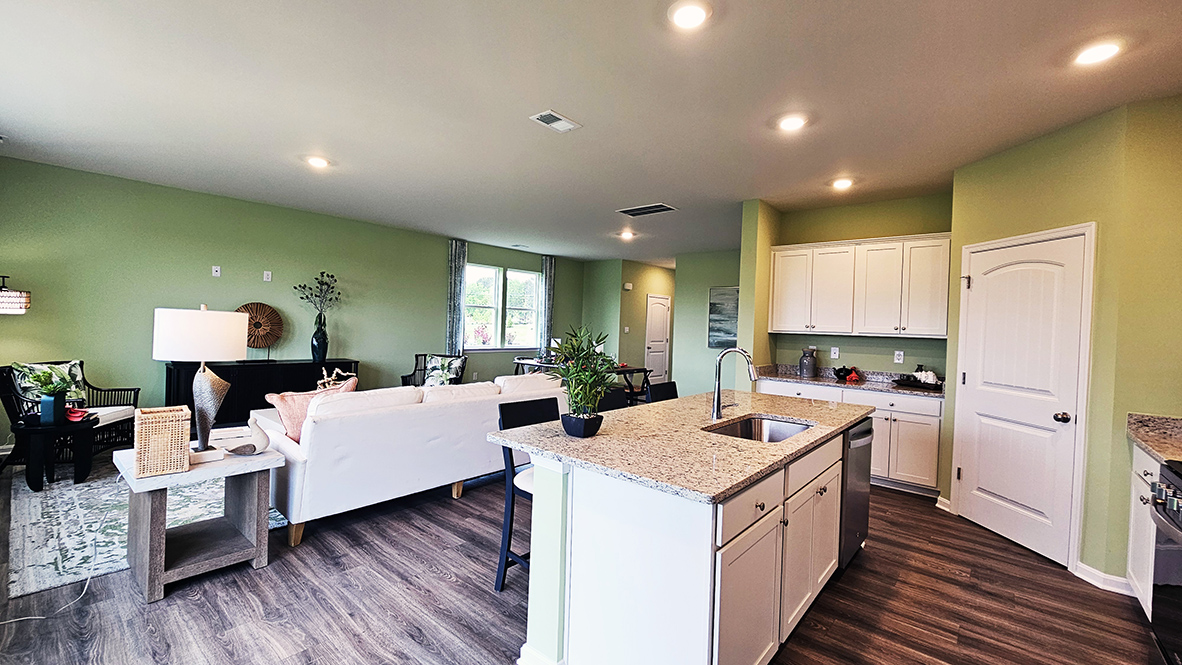 The home's well-appointed kitchen boasts an oversized island.