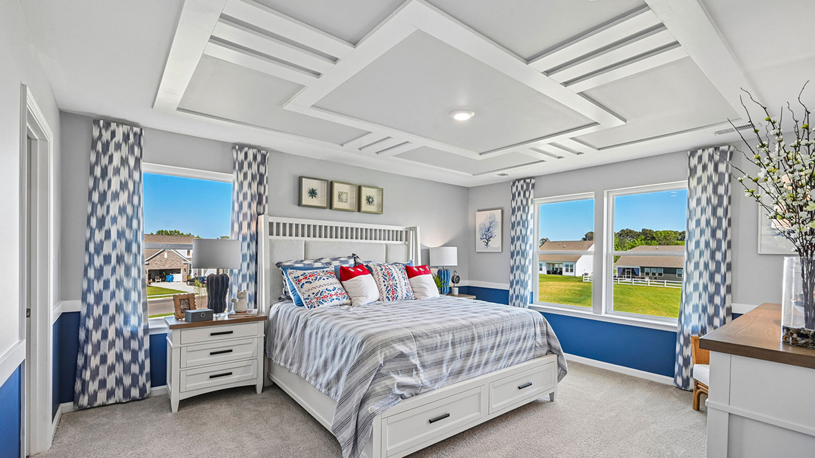 Upstairs, the large owner’s bedroom has a walk-in closet and a modern bathroom.